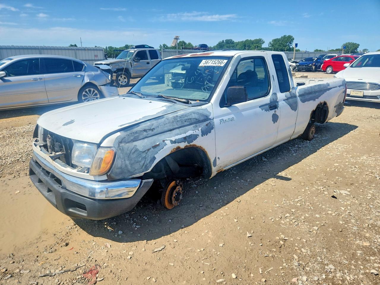 1999 Nissan Frontier XE, VIN 1N6DD26S3XC319795 — Vandalism