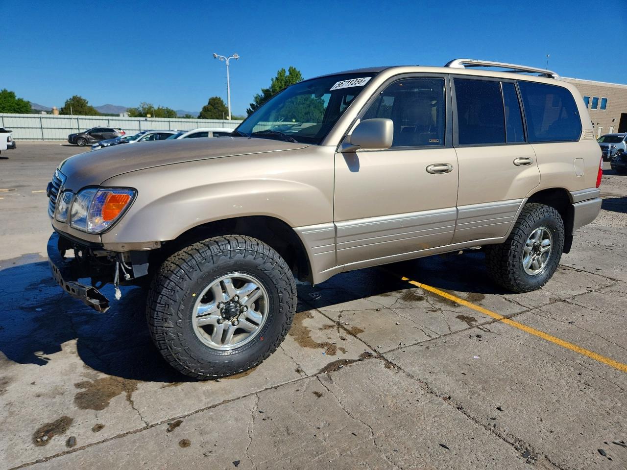 1999 Lexus LX 470, VIN JT6HT00W1X0054570 — Front end