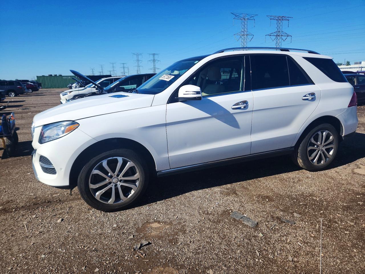 2016 Mercedes-Benz GLE 350, VIN 4JGDA5HB3GA634307 — Side