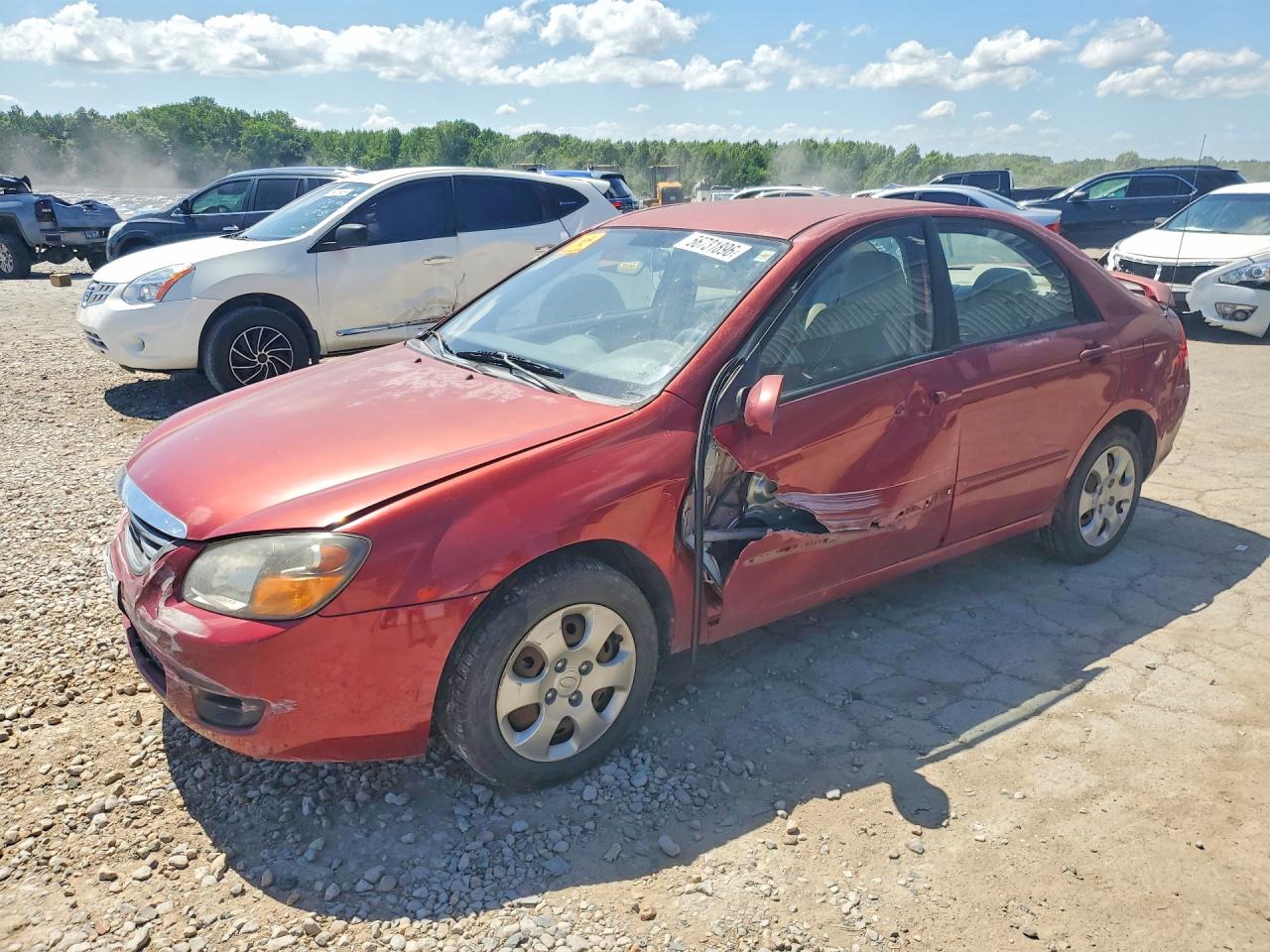 2009 Kia Spectra EX, VIN KNAFE221495606797 — Side