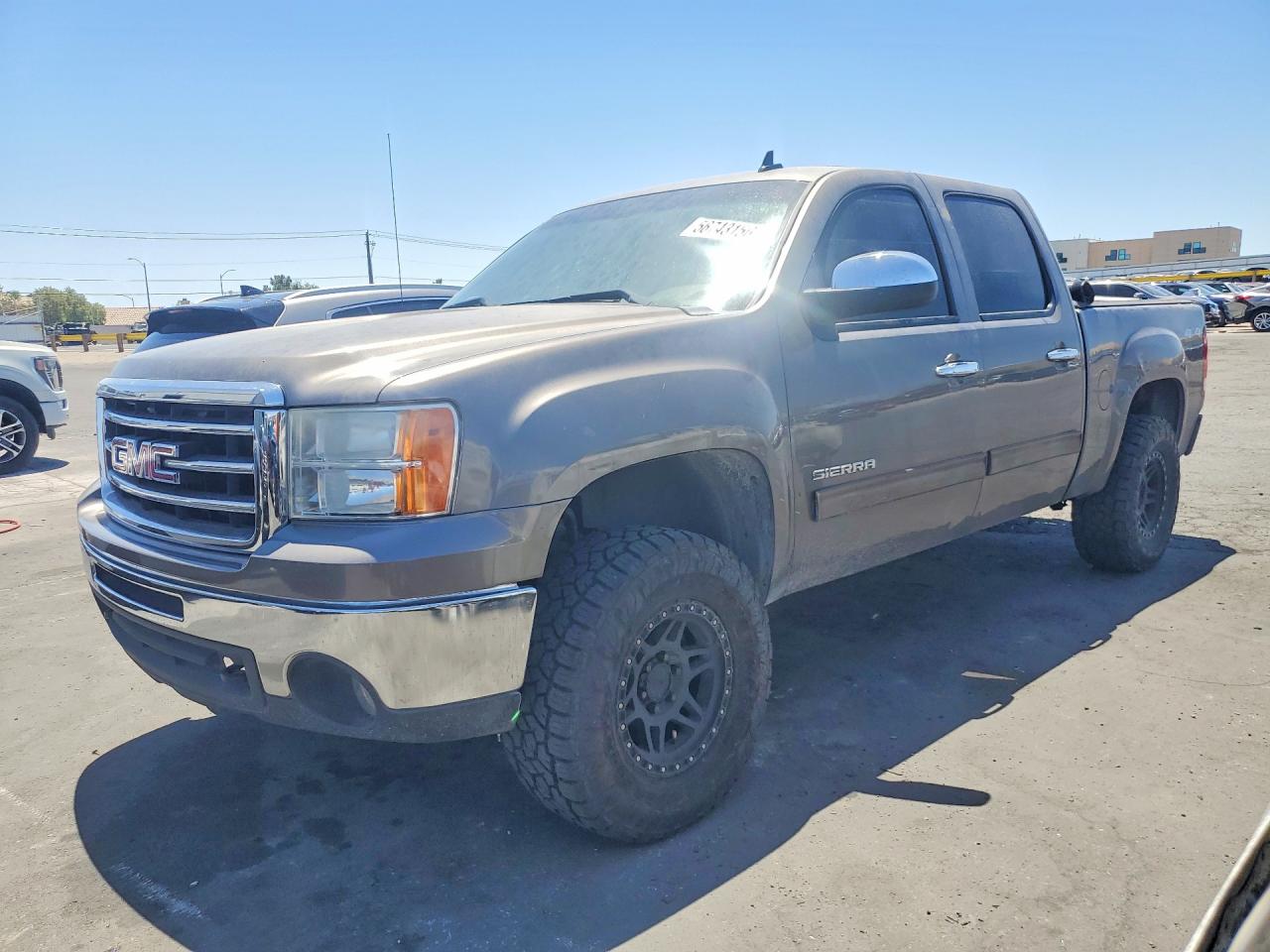2013 GMC Sierra 1500 SLE, VIN 3GTU2VE29DG317716 — Side