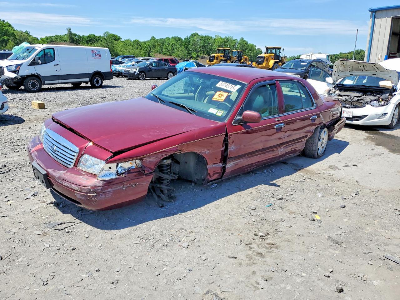 2011 Ford Crown Victoria LX, VIN 2FABP7EV4BX150298 — Side