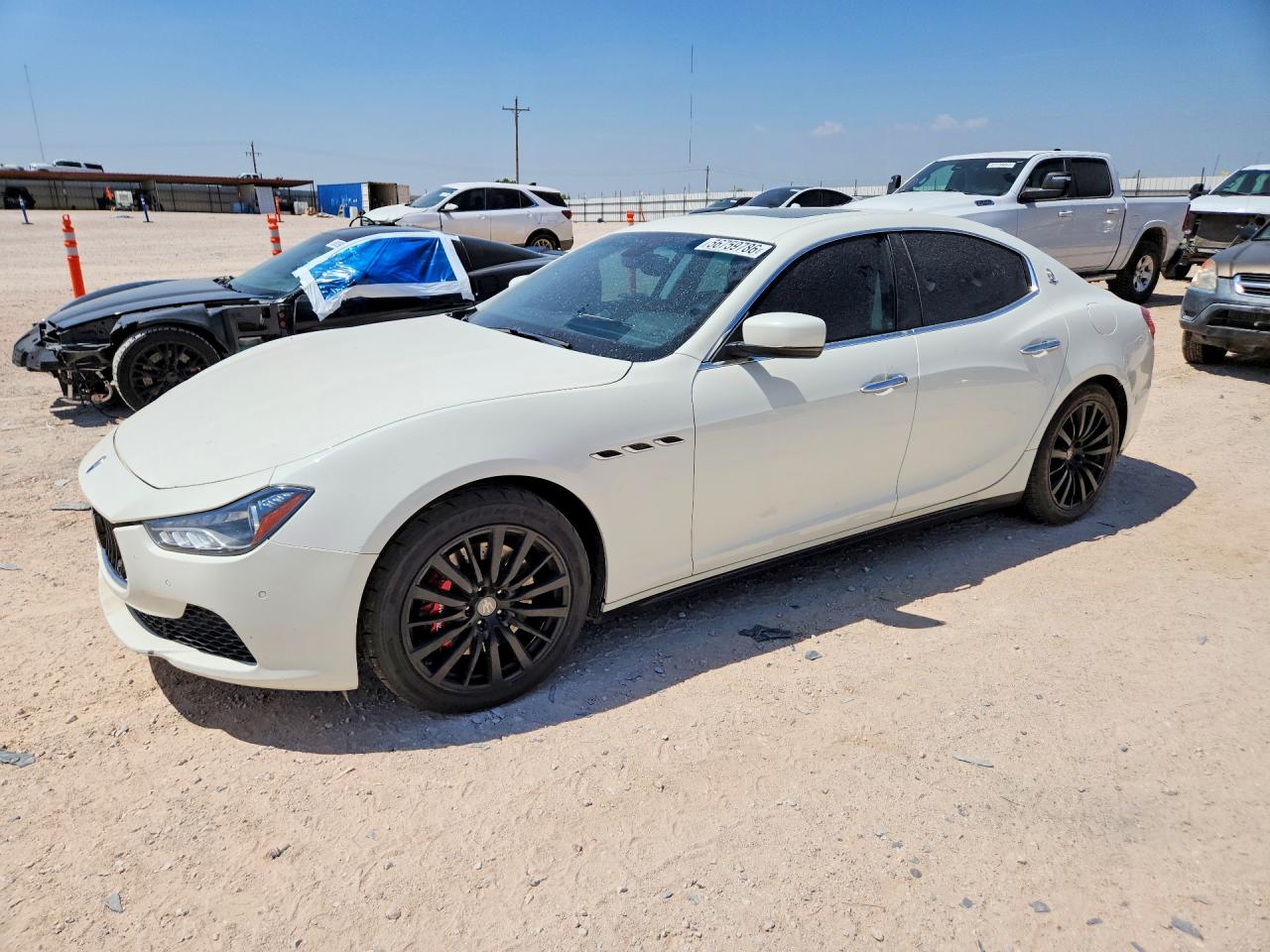 2014 Maserati Ghibli S Q4, VIN ZAM57RTAXE1106530 — Зад