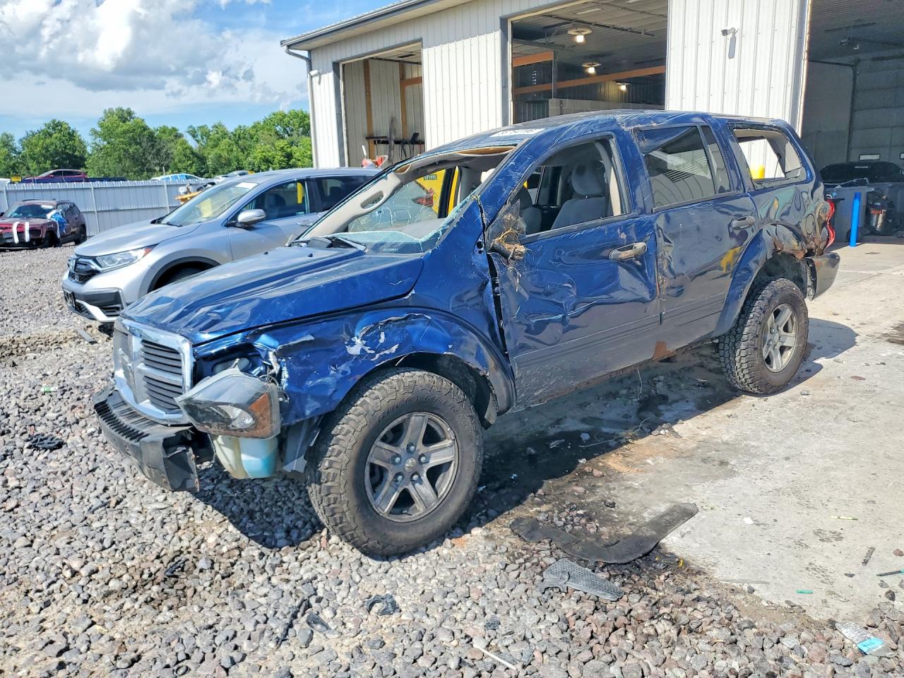 2005 Dodge Durango SLT, VIN 1D4HB48D75F572721 — Rollover