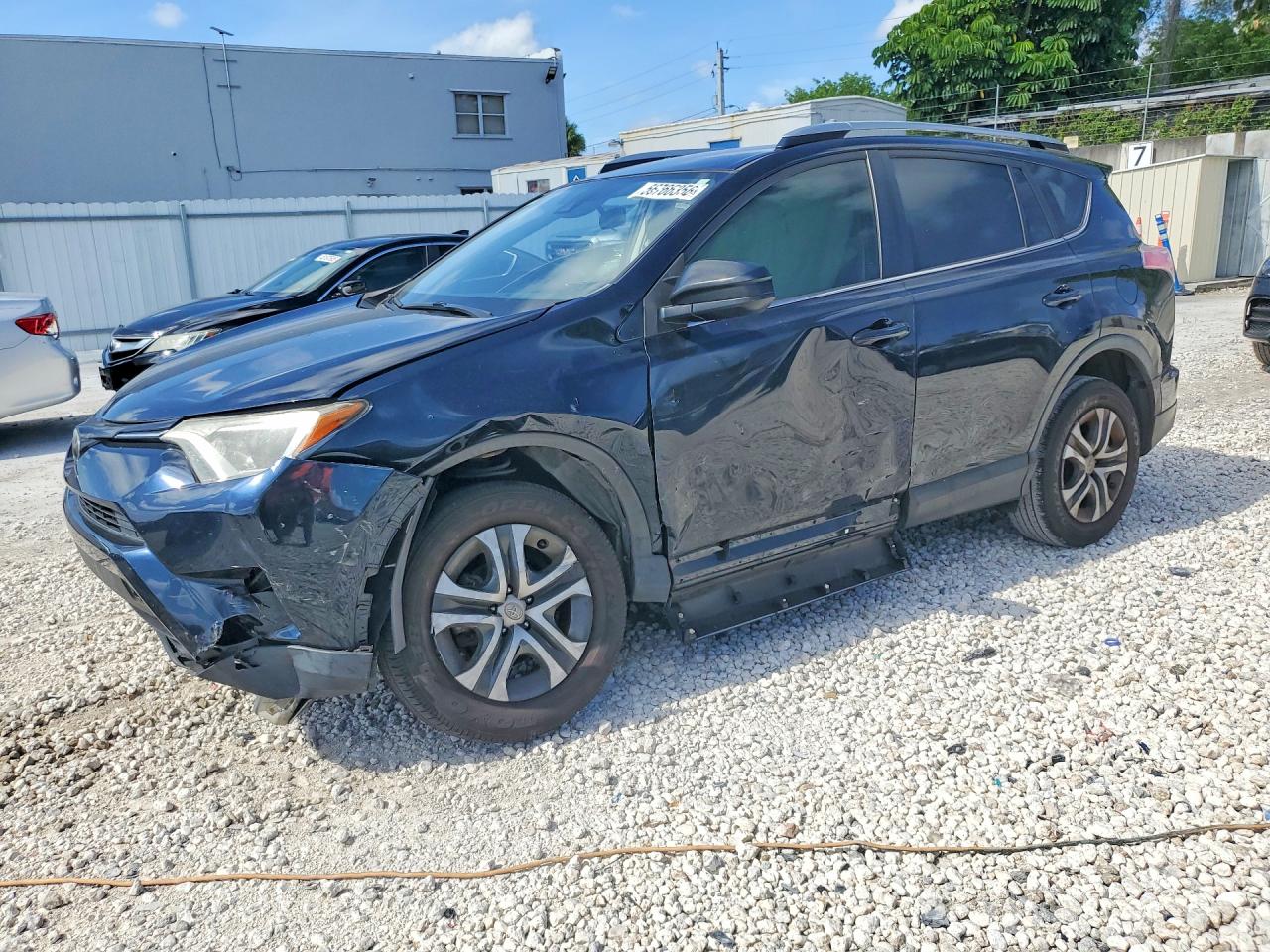 2018 Toyota RAV4 LE, VIN JTMZFREV5JJ210183 — Front end