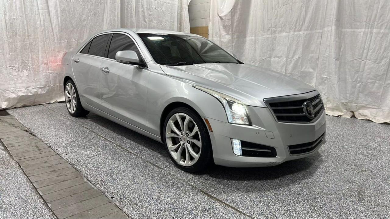 2014 Cadillac ATS Performance RWD, VIN 1G6AD5S36E0100031 — Prior damage history