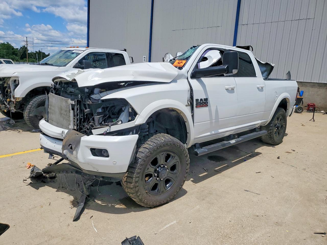 2016 Ram 2500 Laramie, VIN 3C6UR5FL1GG350837 — Rollover