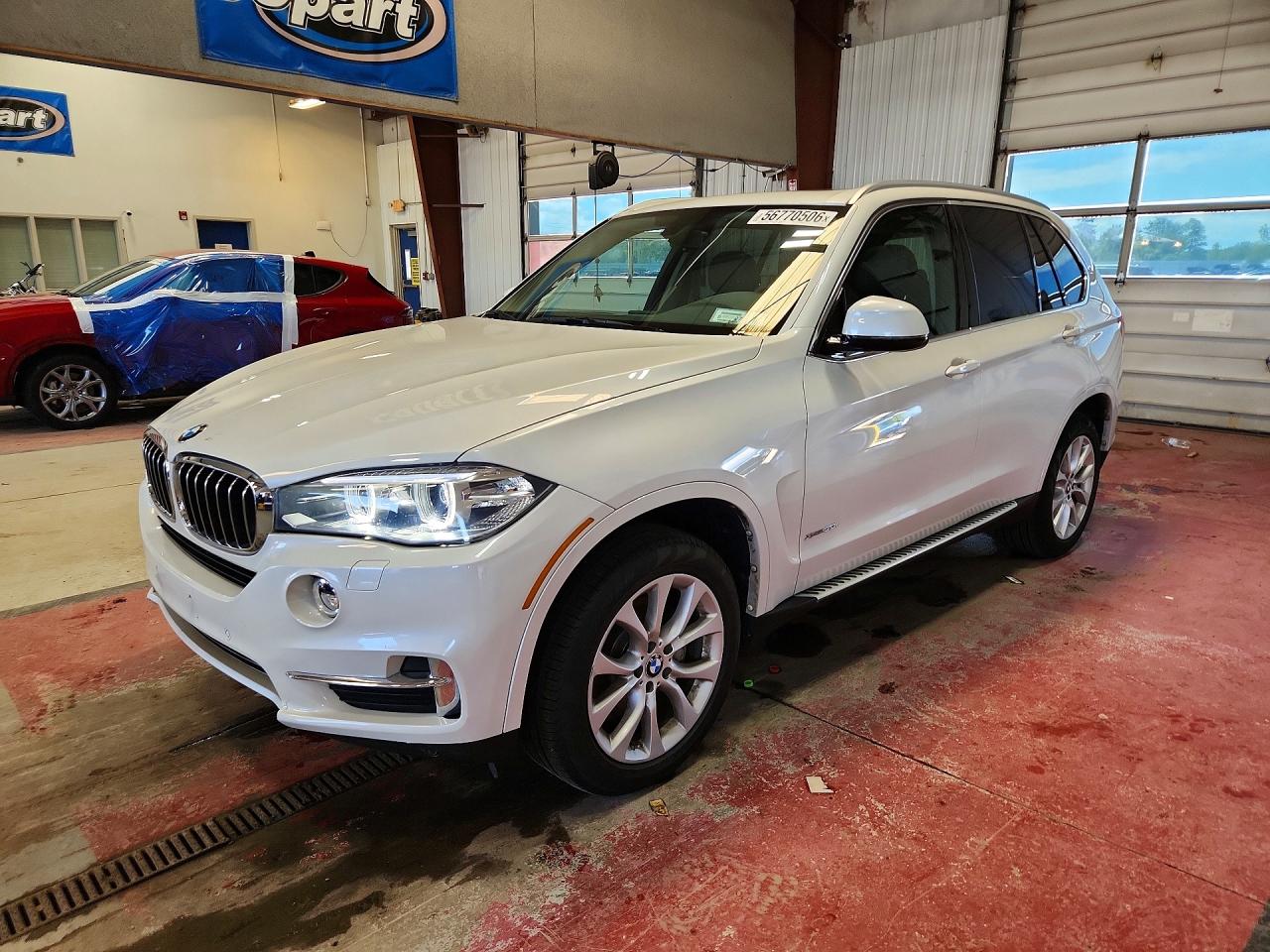 2015 BMW X5 xDrive35i, VIN 5UXKR0C59F0P12861 — Side