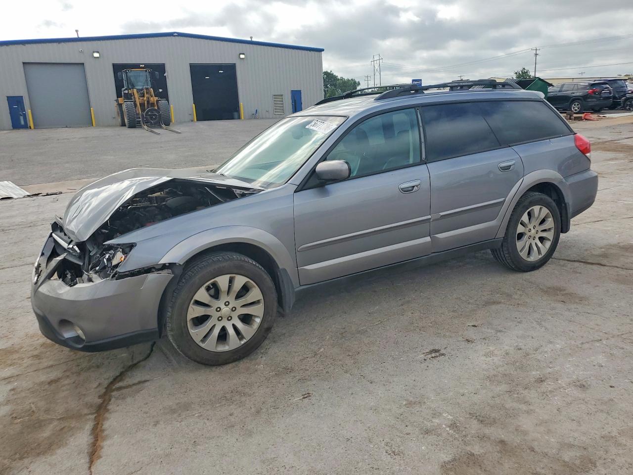 2009 Subaru Outback Limited, VIN 4S4BP66C497329728 — Перед