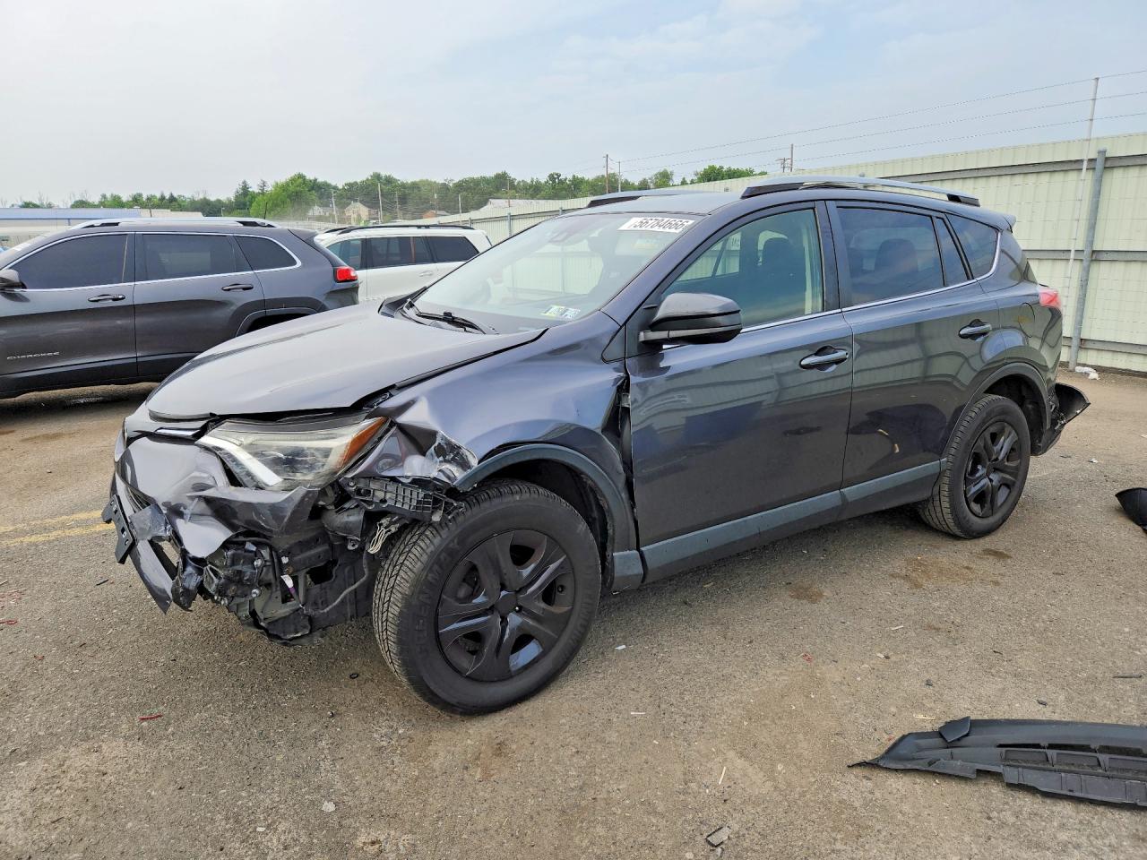 2018 Toyota RAV4 LE, VIN JTMBFREV9JJ216618 — Rear end