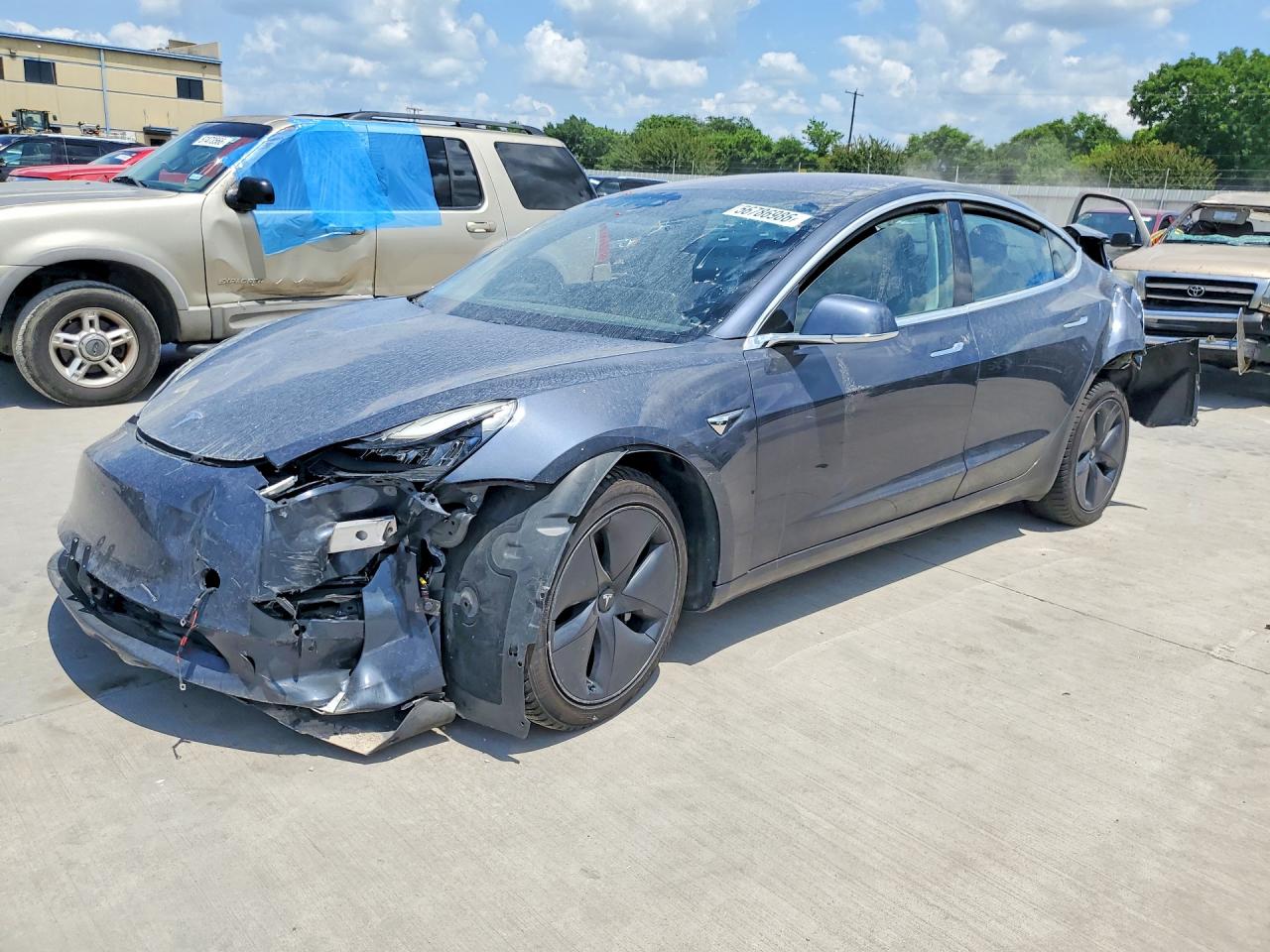 2018 Tesla Model 3 Long Range Battery, VIN 5YJ3E1EA2JF016371 — Rear end