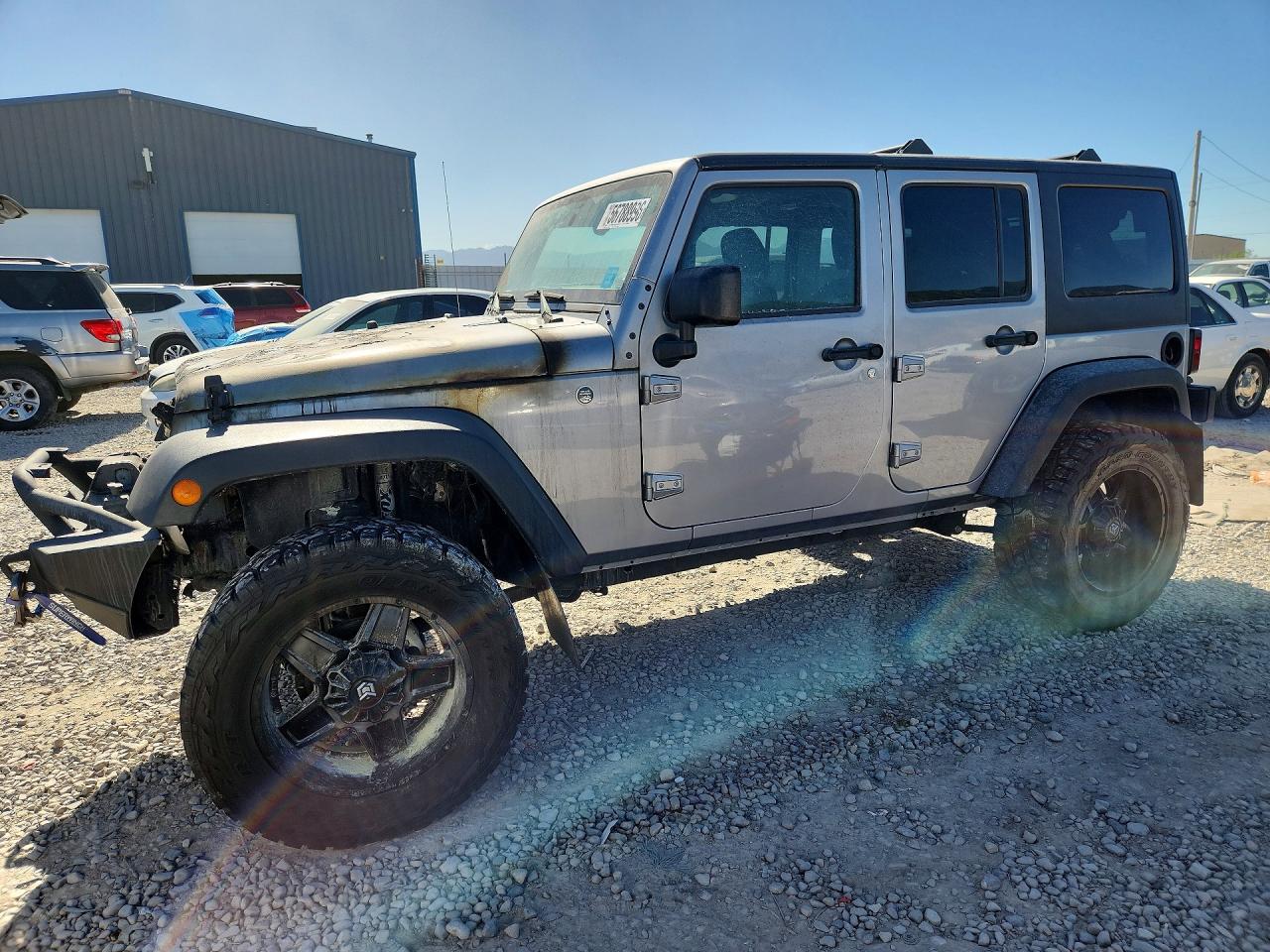 2018 Jeep Wrangler Unlimited Sport S, VIN 1C4HJWDG8JL925264 — Burn