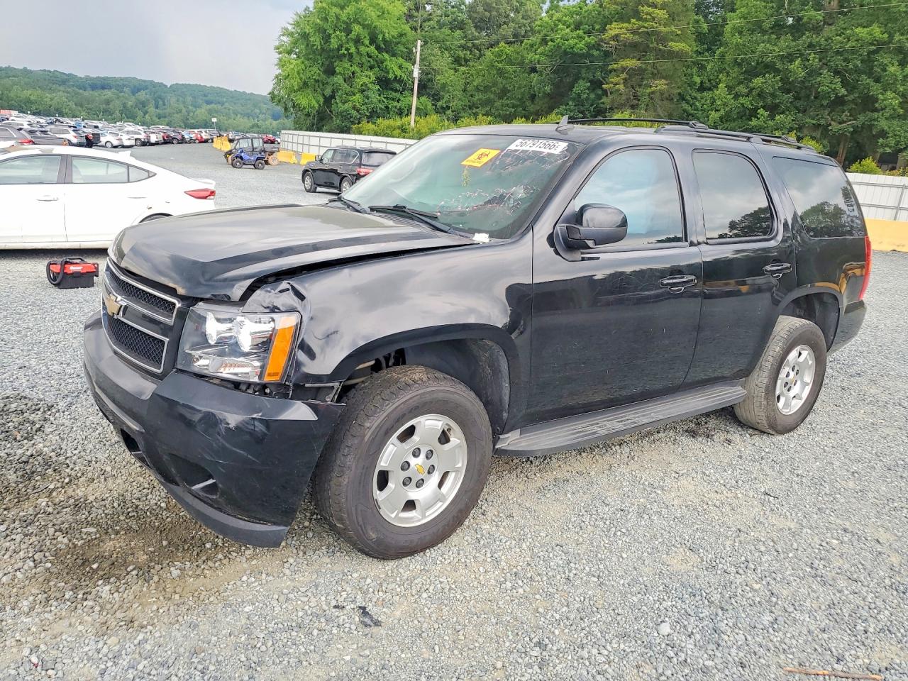 2011 Chevrolet Tahoe LT, VIN 1GNSCBE01BR241303 — Front end