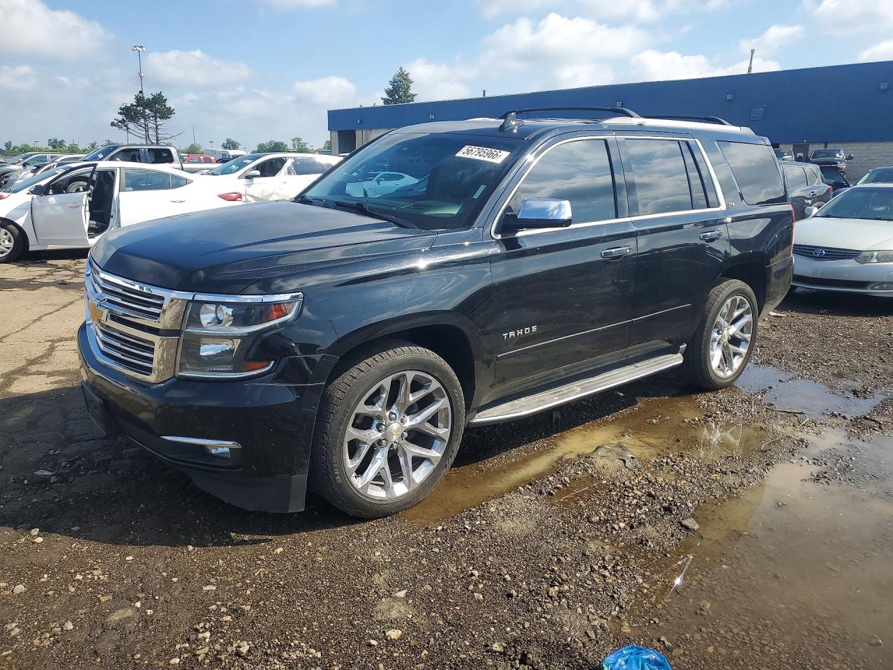 2016 Chevrolet Tahoe LTZ, VIN 1GNSKCKC8GR198447 — Зад