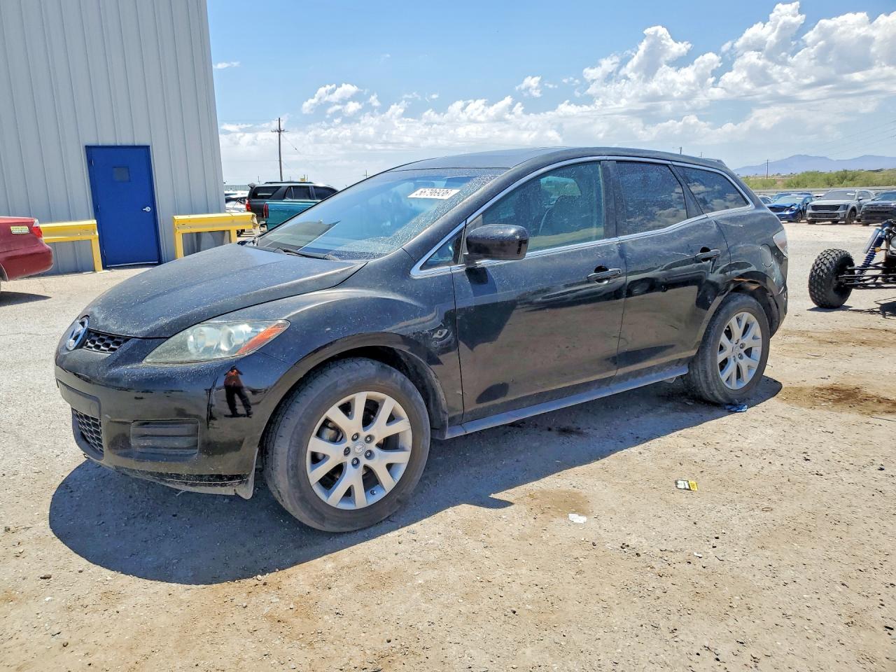 2009 Mazda CX-7 Touring, VIN JM3ER293790228893 — Side
