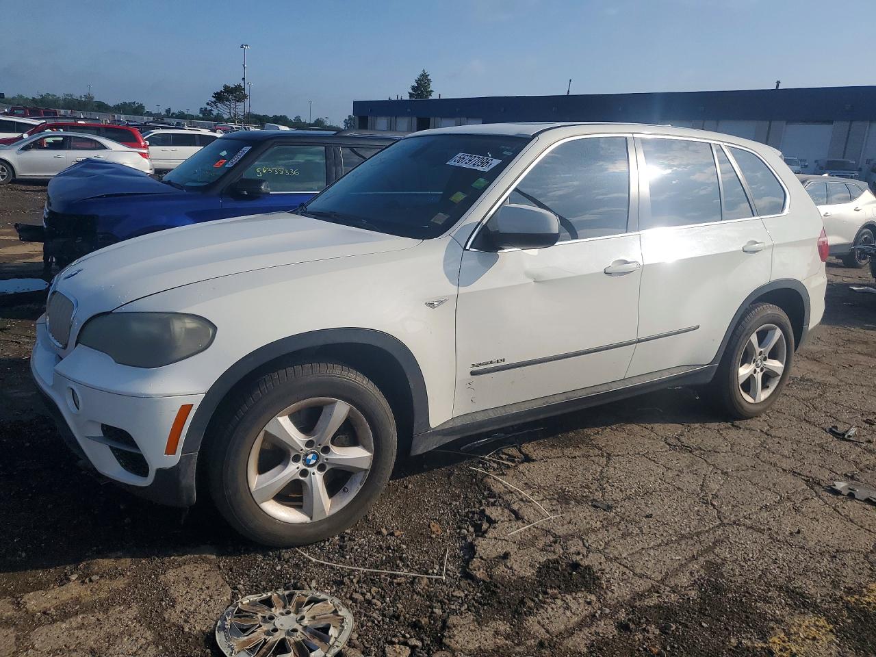 2011 BMW X5 50i, VIN 5UXZV8C50BL419304 — Мелкие вмятины и царапины
