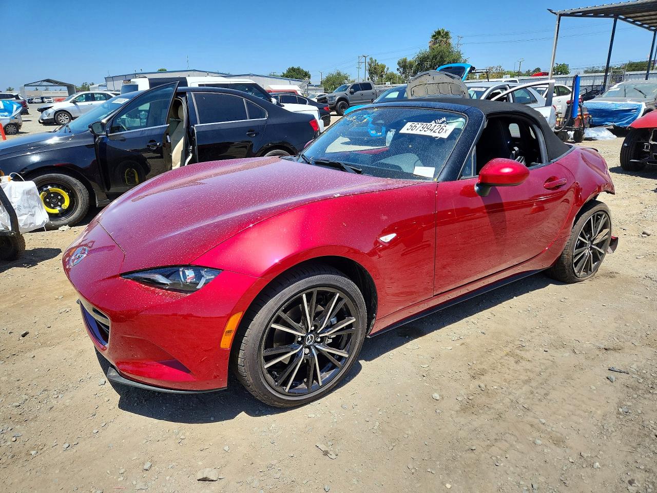 2025 Mazda MX-5 Miata Grand Touring, VIN JM1NDAD75S0658813 — Rear end