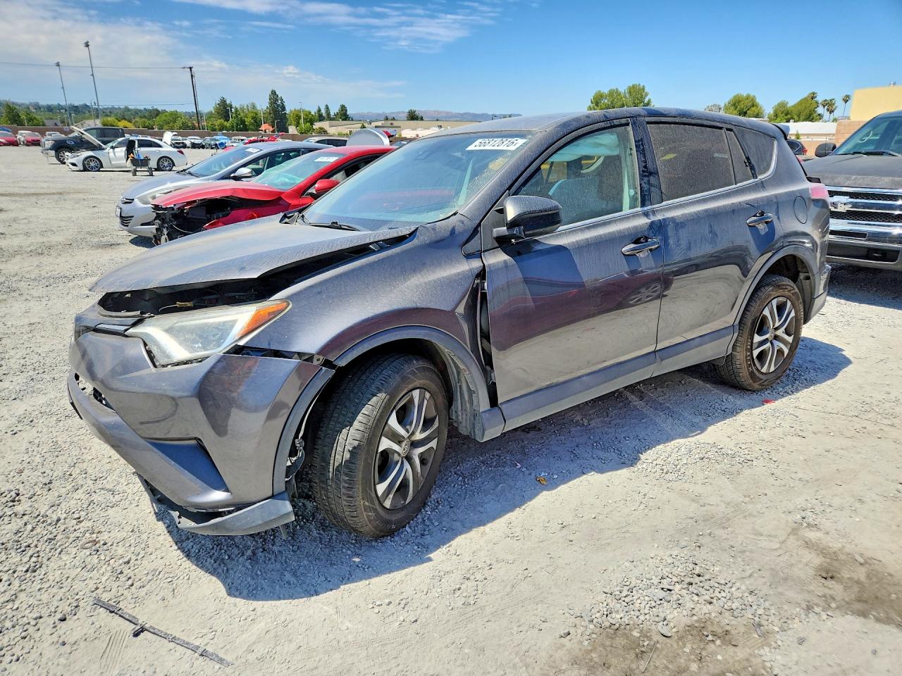 2018 Toyota RAV4 LE, VIN 2T3BFREV2JW719330 — Rear end