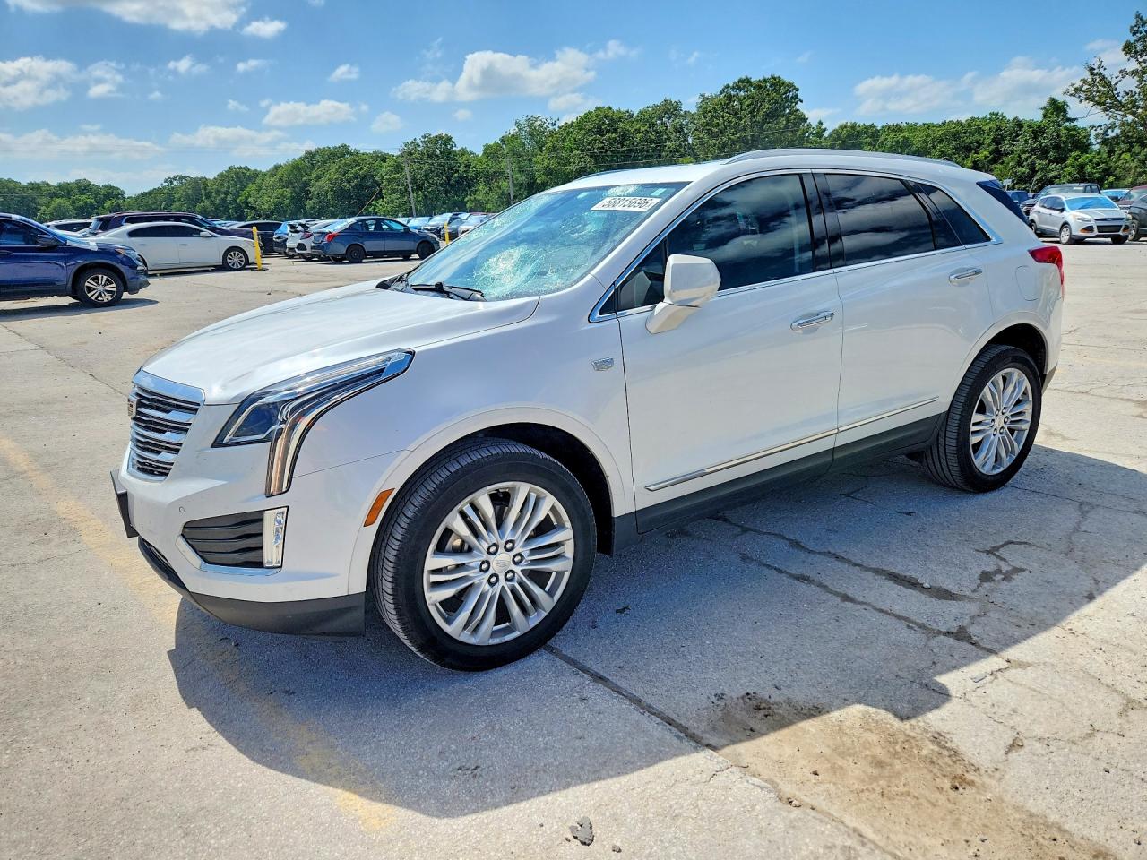 2019 Cadillac XT5 Premium Luxury FWD, VIN 1GYKNERS0KZ204866 — Hail