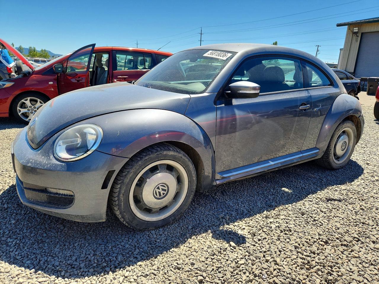 2012 Volkswagen Beetle 2.5L PZEV, VIN 3VWJP7AT5CM614980 — Minor dents and scratches