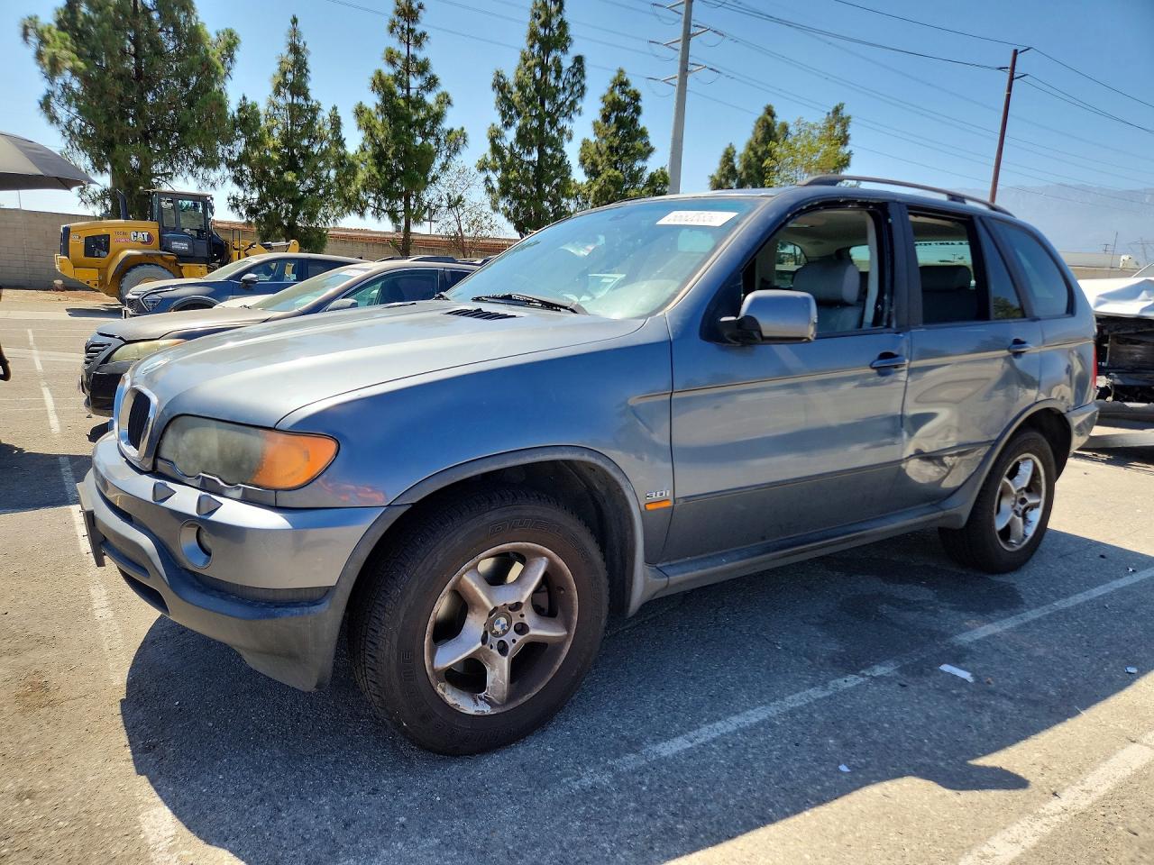 2002 BMW X5 3.0i, VIN 5UXFA53572LP56775 — Бок