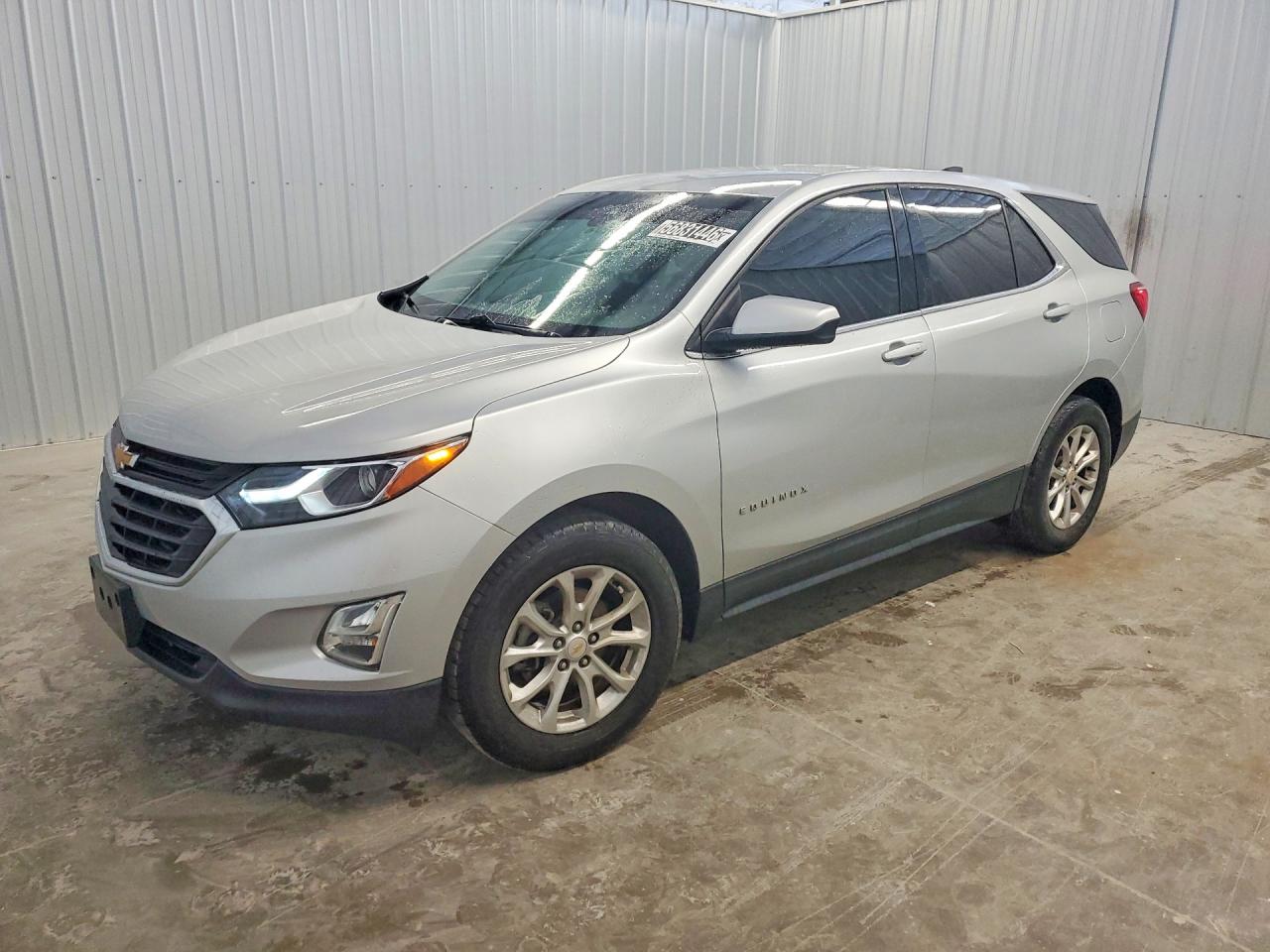 2020 Chevrolet Equinox LT, VIN 2GNAXJEV6L6177200 — Hail