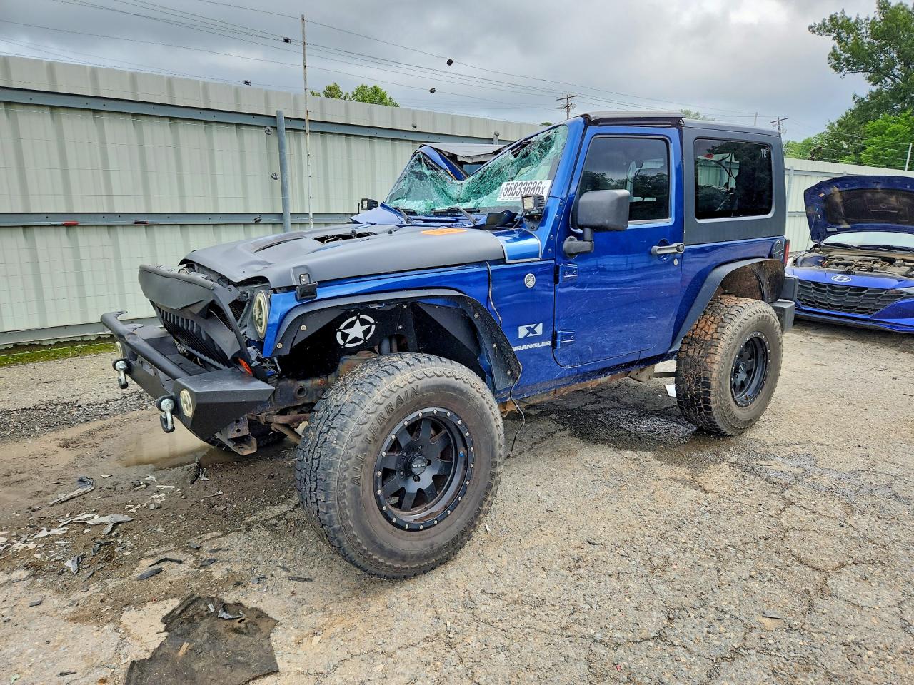 2009 Jeep Wrangler X, VIN 1J4FA24199L712969 — Hail
