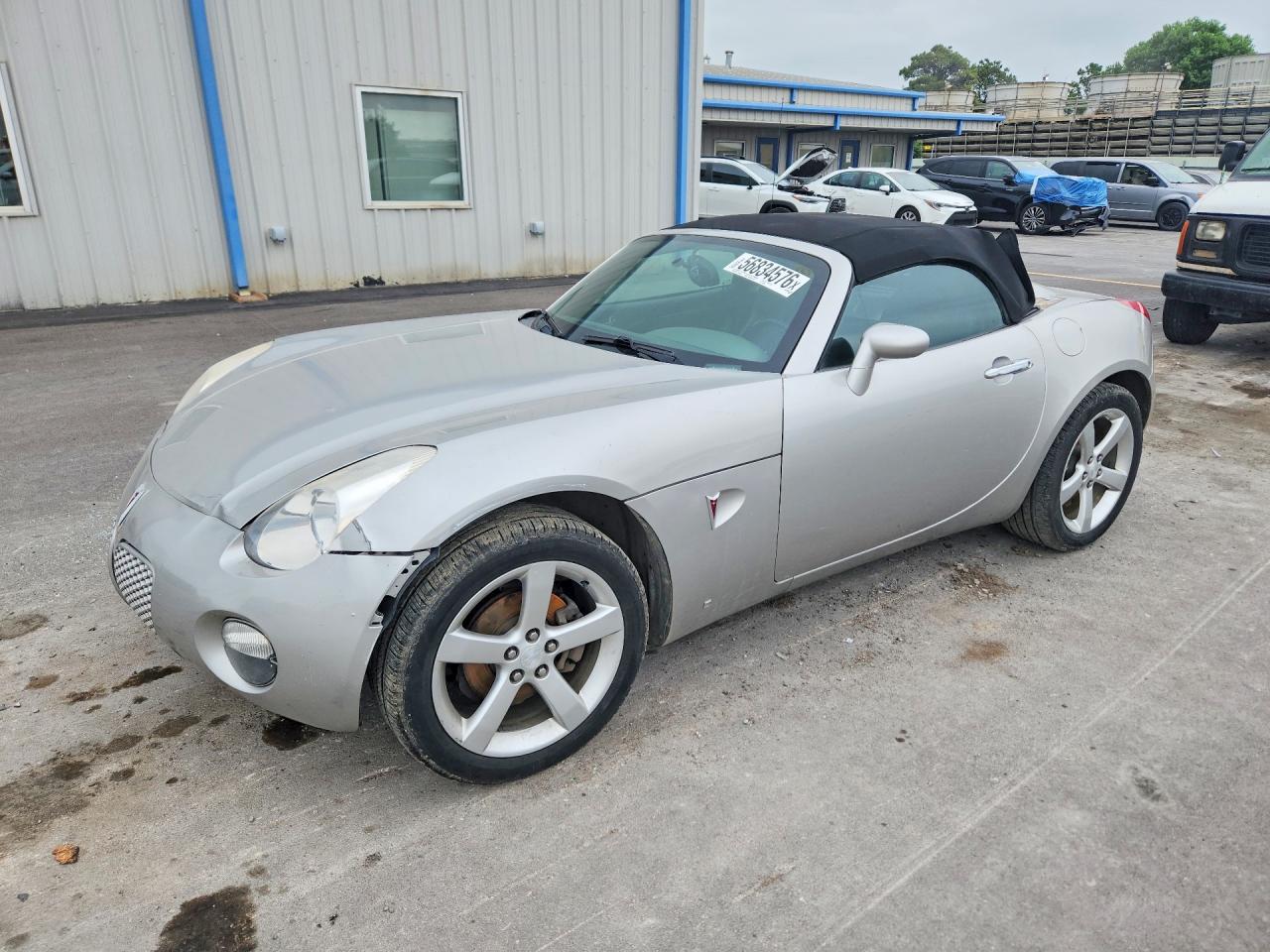 2008 Pontiac Solstice, VIN 1G2MC35B68Y110864 — Side