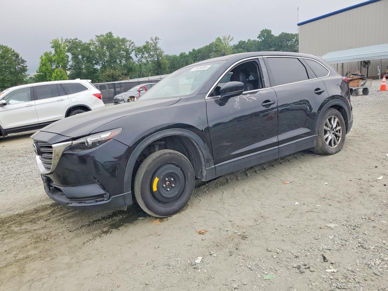 2017 Mazda CX-9 Touring, VIN JM3TCACY8H0136231 — Front end