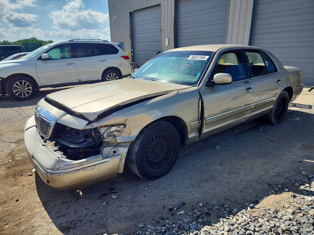 1999 Mercury Grand Marquis GS, VIN 2MEFM74W8XX696817 — Front end