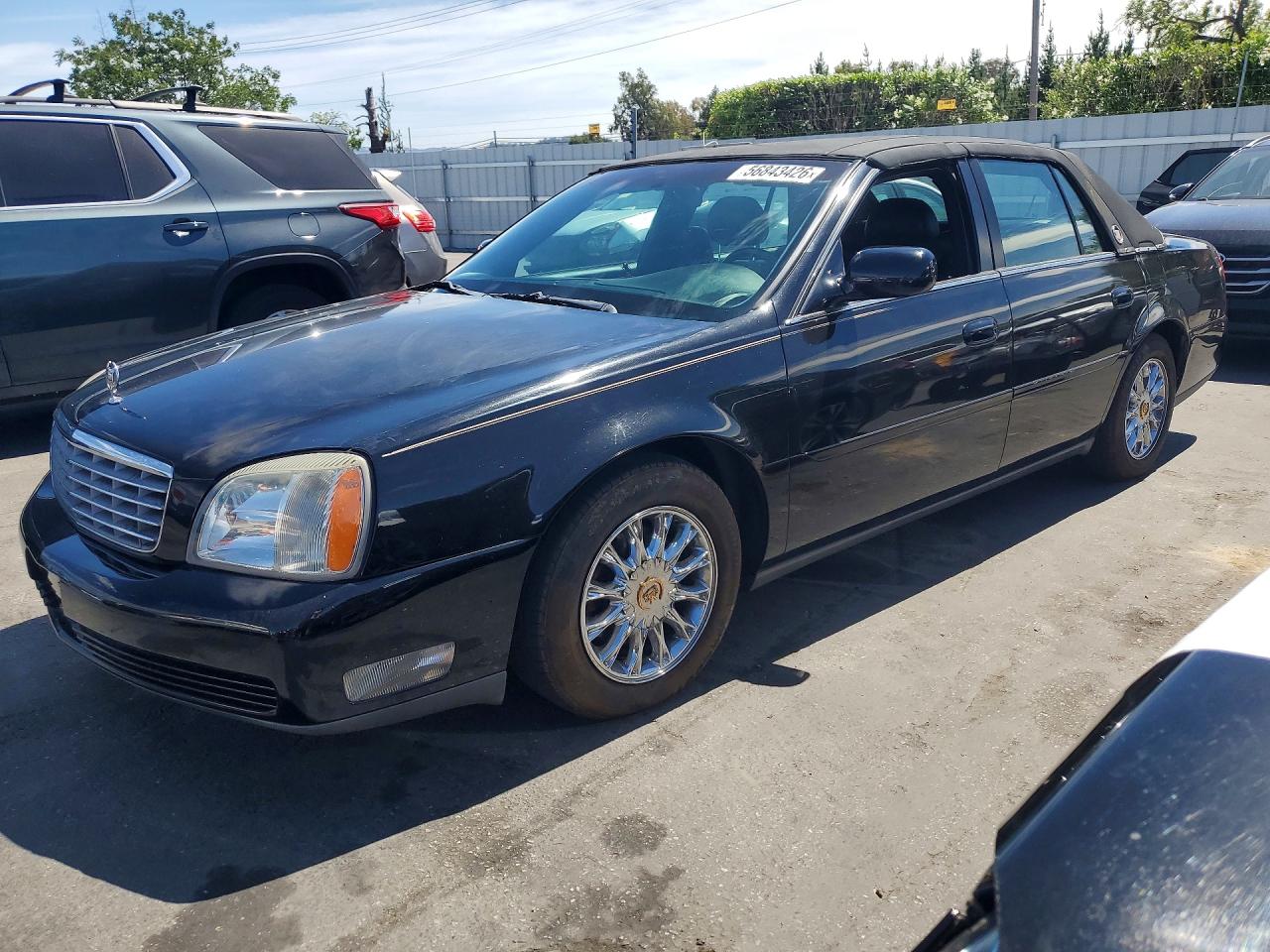 2004 Cadillac DeVille, VIN 1G6KD54Y84U216495 — Minor dents and scratches