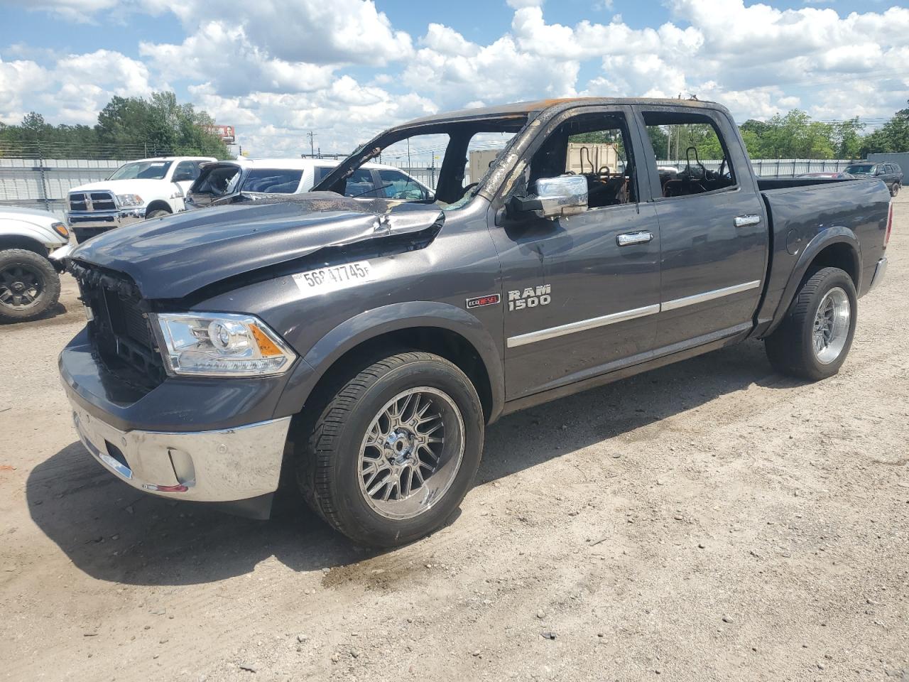 2015 Ram 1500 Laramie, VIN 1C6RR6NM8FS592702 — Пожар в салоне