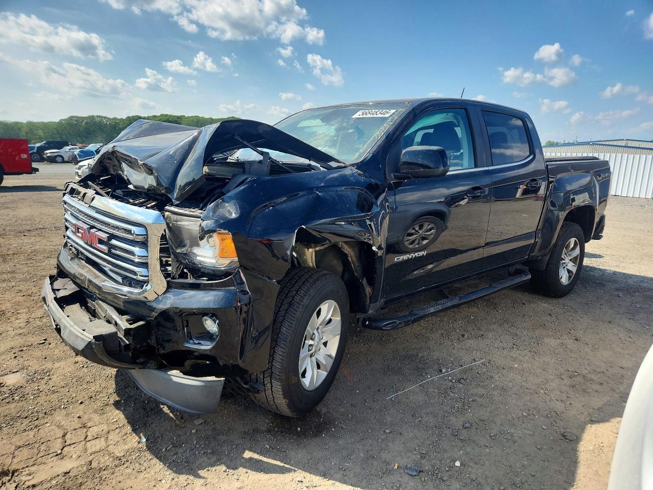 2015 GMC Canyon 4WD SLE, VIN 1GTG6BE30F1139737 — Front end