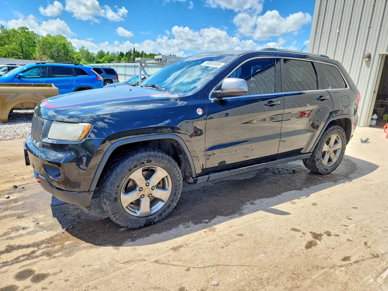 2013 Jeep Grand Cherokee Laredo Trailhawk, VIN 1C4RJFAT5DC591429 — Hail