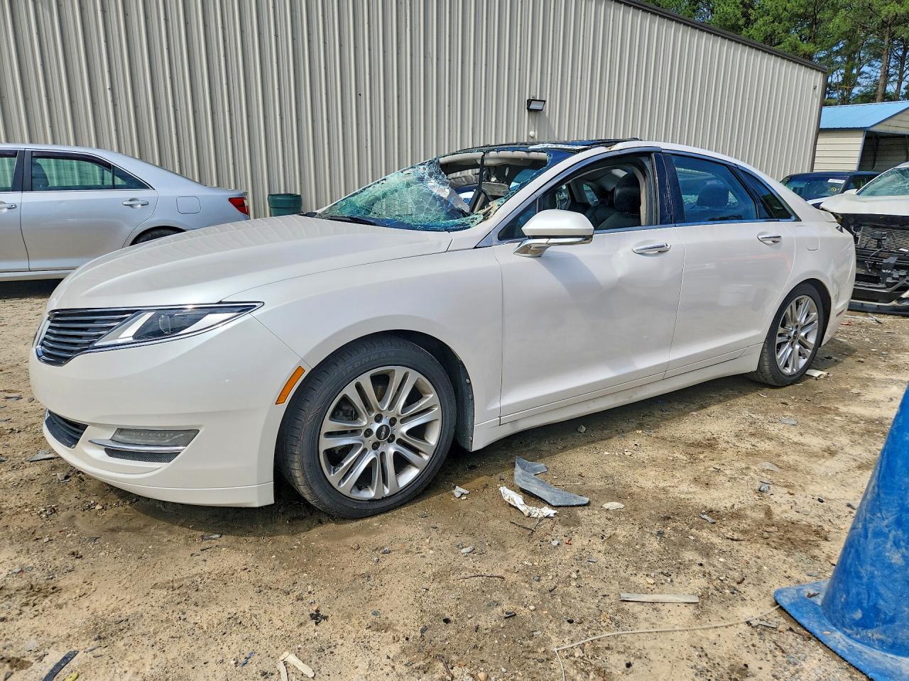 2013 Lincoln MKZ, VIN 3LN6L2G91DR815309 — Vandalism