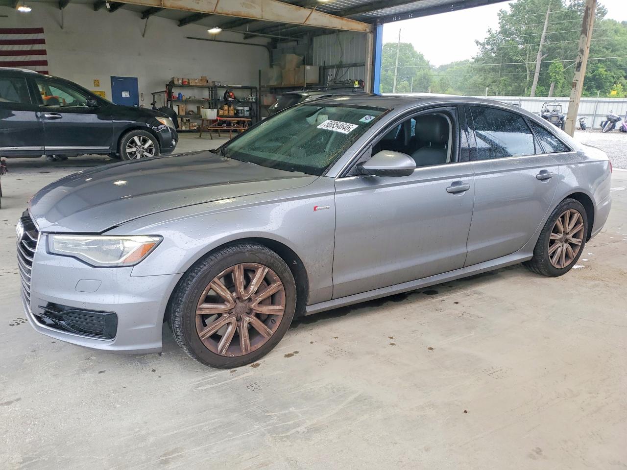 2016 Audi A6 Premium Plus, VIN WAUFGAFC2GN060479 — Side