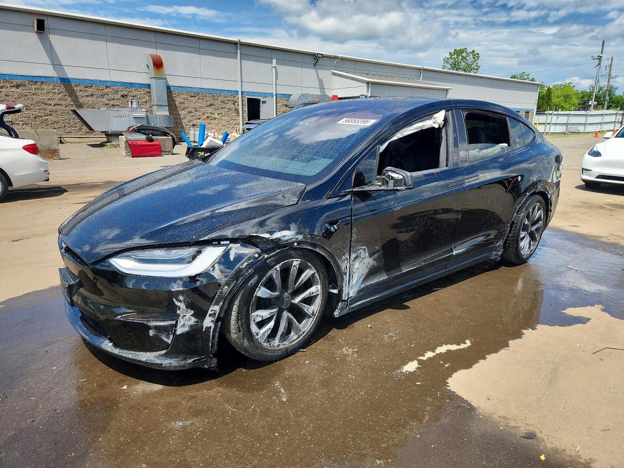 2023 Tesla Model X, VIN 7SAXCDE52PF398005 — Side