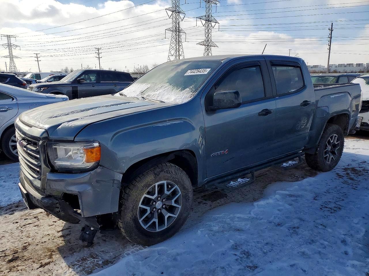 2022 GMC Canyon 4WD AT4, VIN 1GTG6FEN6N1203237 — Side