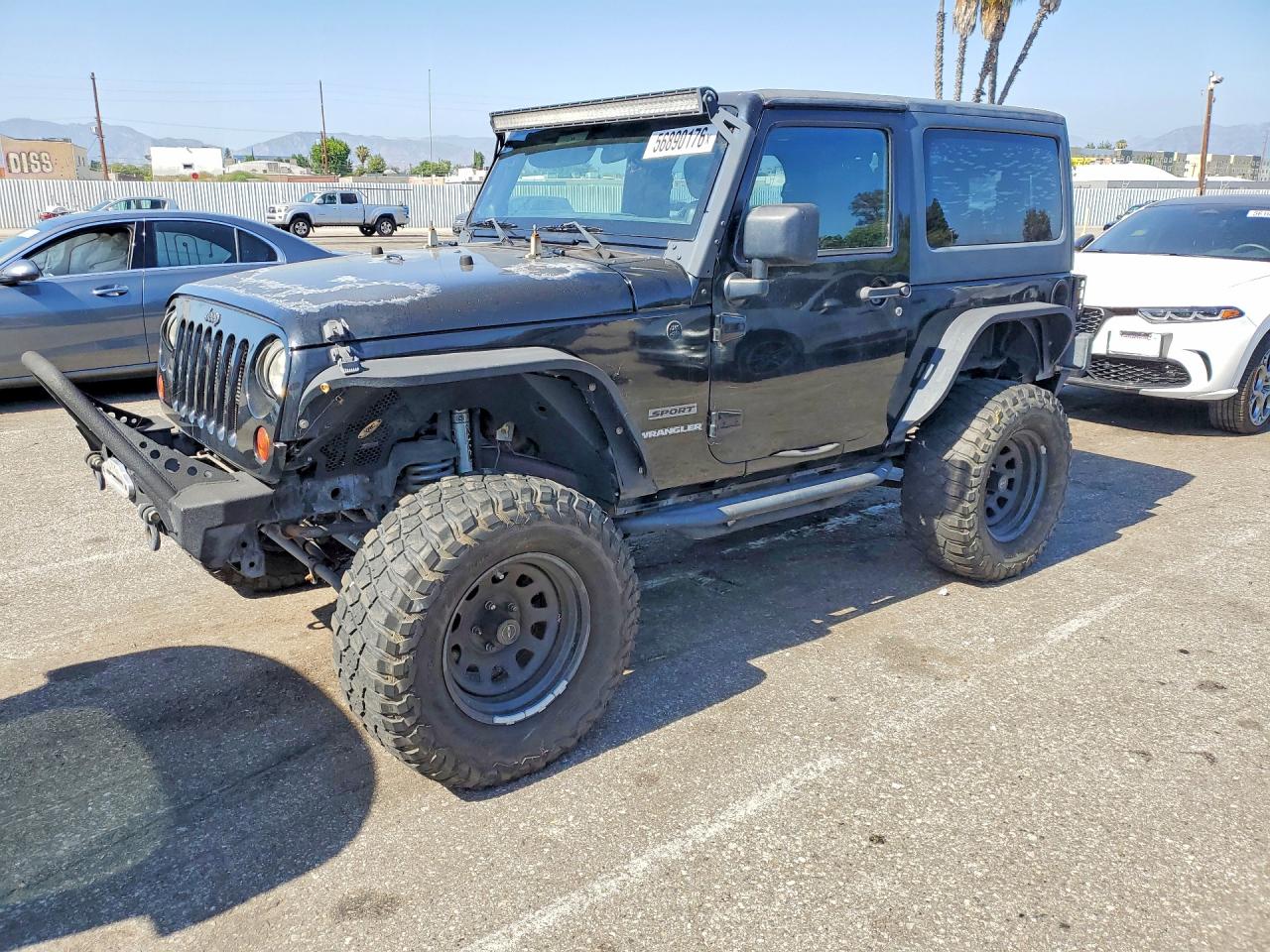 2012 Jeep Wrangler Sport, VIN 1C4AJWAG1CL281115 — Minor dents and scratches