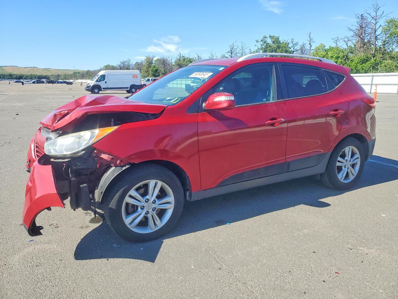 2012 Hyundai Tucson GLS, VIN KM8JUCAC0CU456138 — Front end