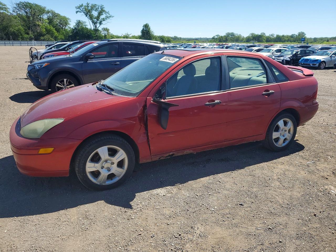 2004 Ford Focus ZTS, VIN 1FAFP38Z24W116710 — Бок