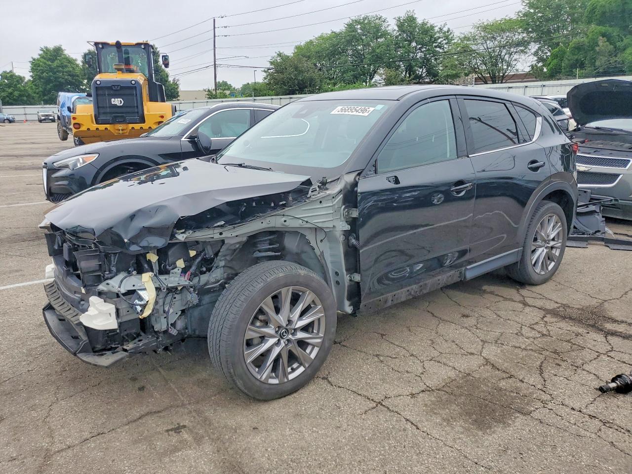 2021 Mazda CX-5 Grand Touring, VIN JM3KFBDM0M0366456 — Front end