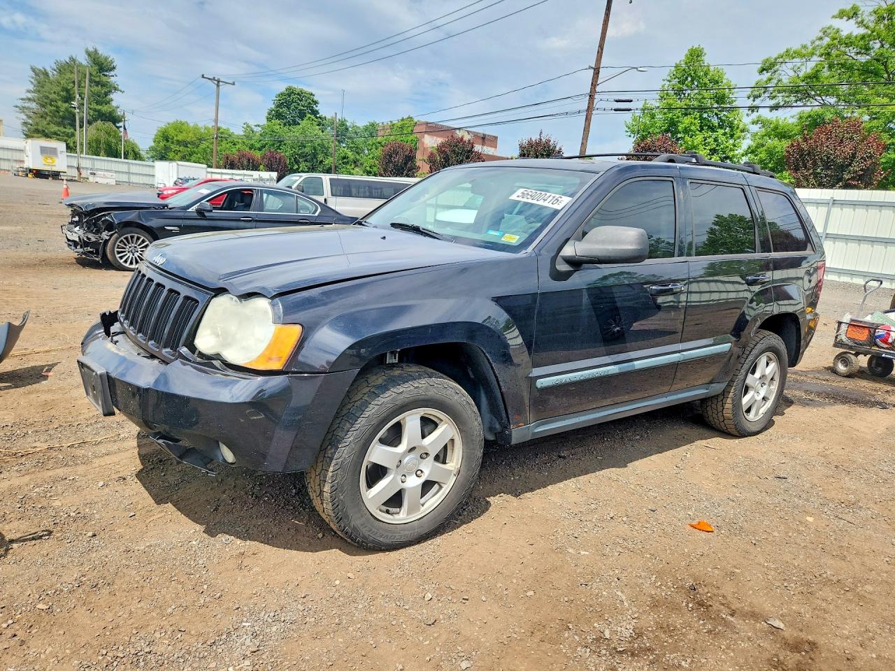 2009 Jeep Grand Cherokee Rocky Mountain, VIN 1J8GR48K39C530534 — Front end