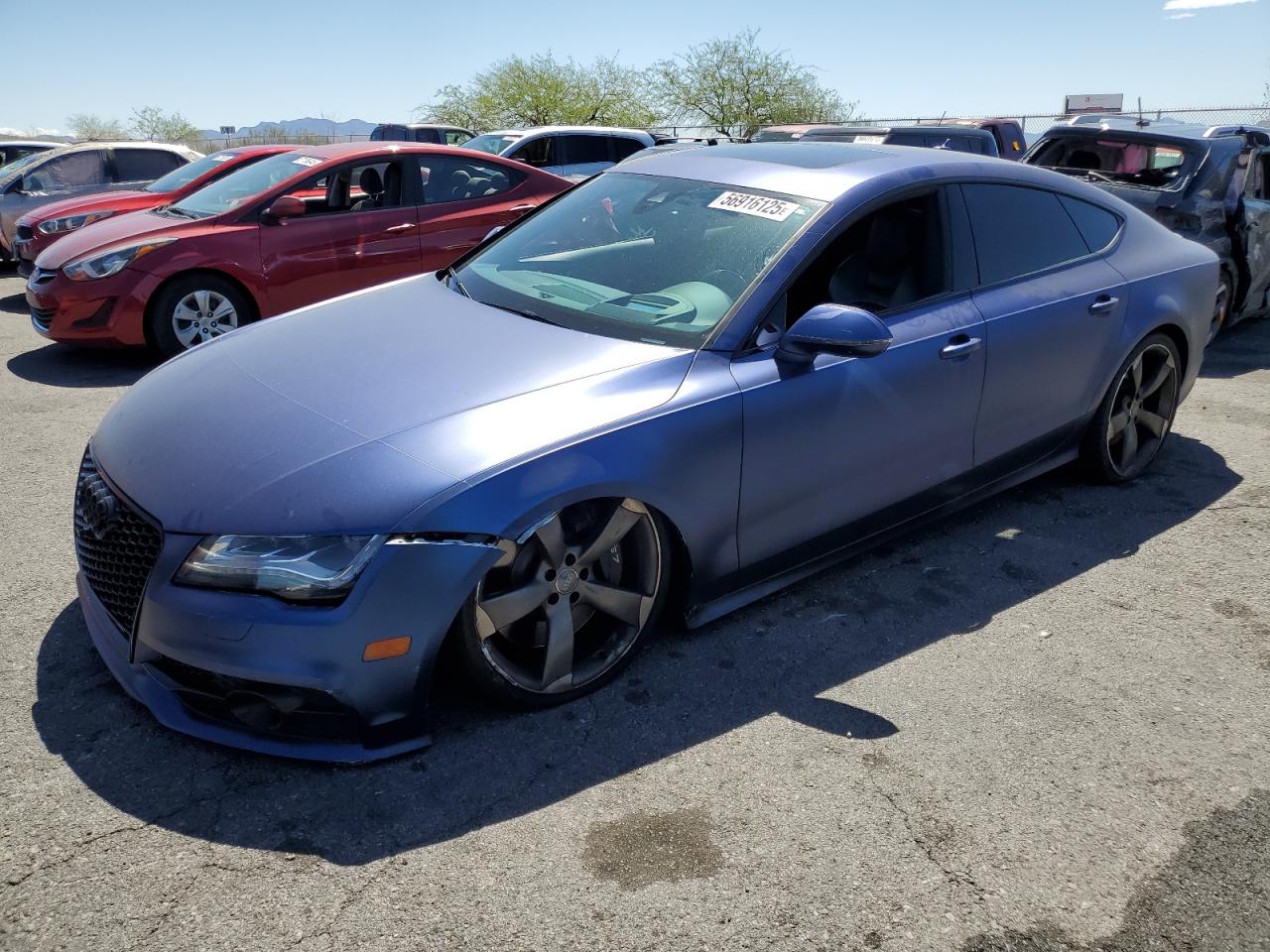 2015 Audi S7, VIN WAUW2AFCXFN032765 — Auction photo