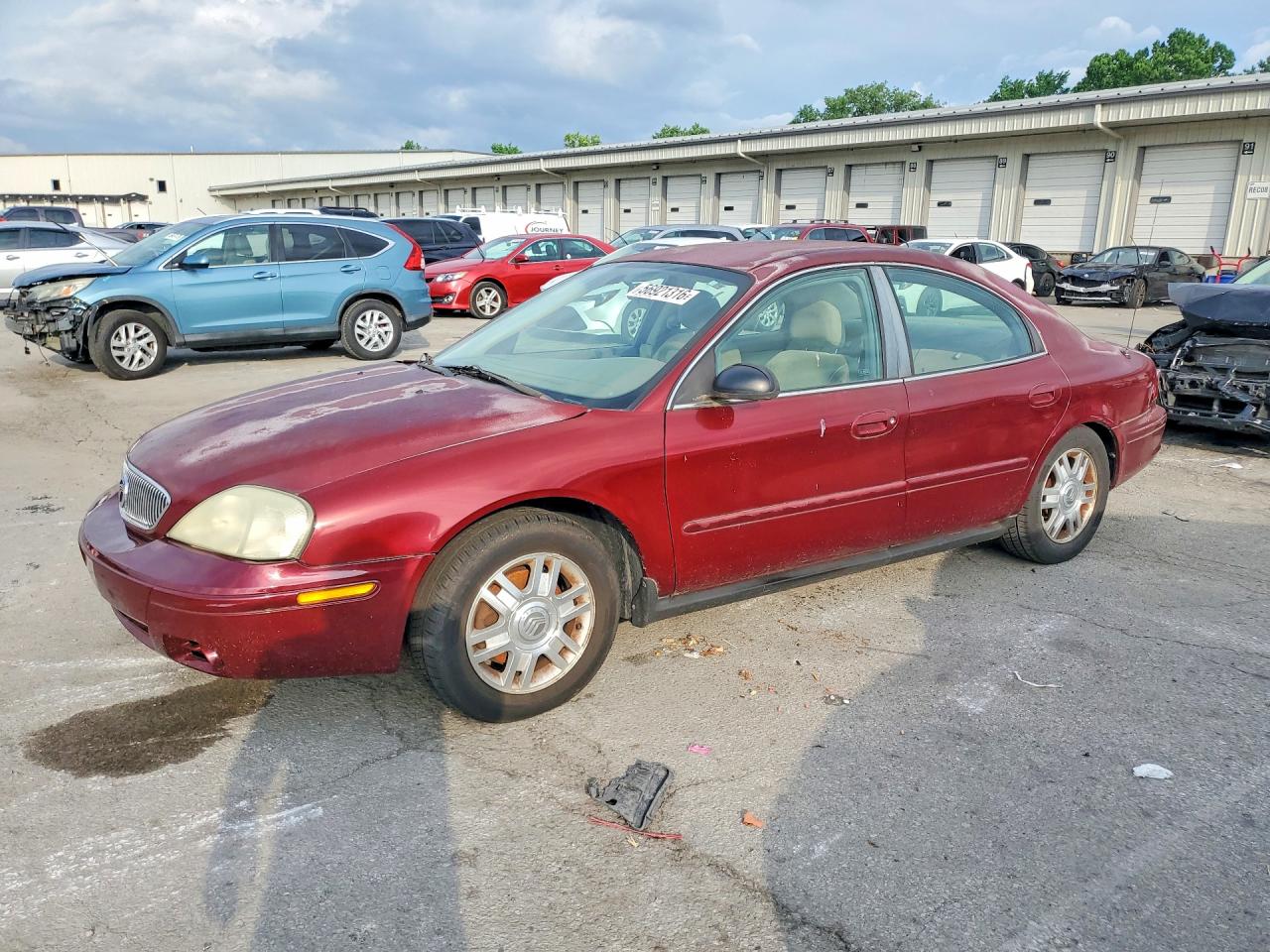 2005 Mercury Sable GS, VIN 1MEFM502X5A625471 — Side