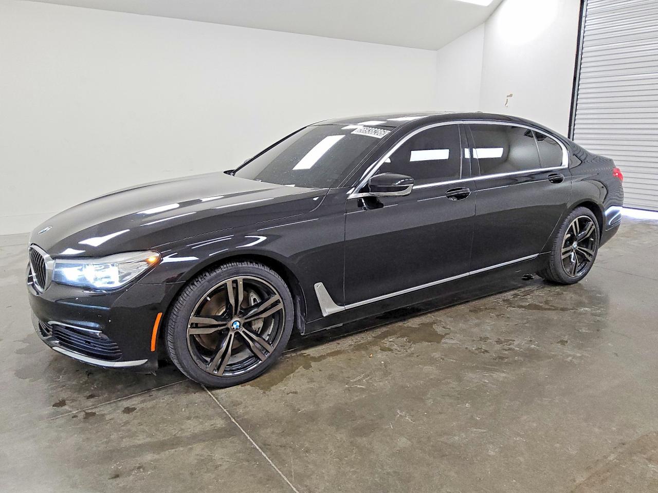 2016 BMW 7 Series 740i, VIN WBA7E2C59GG547592 — Minor dents and scratches