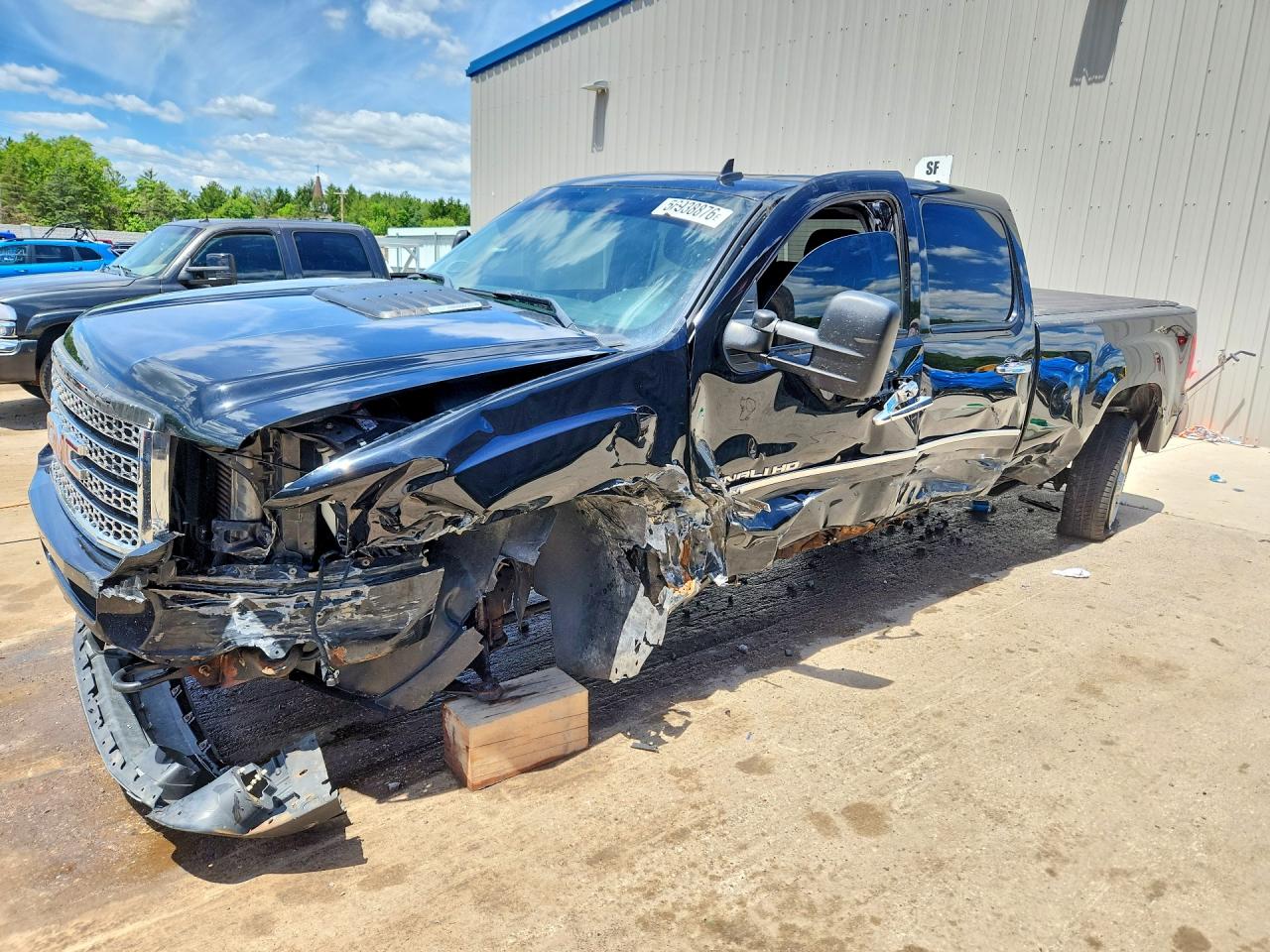 2012 GMC Sierra 2500HD Denali, VIN 1GT125E89CF183524 — Front end