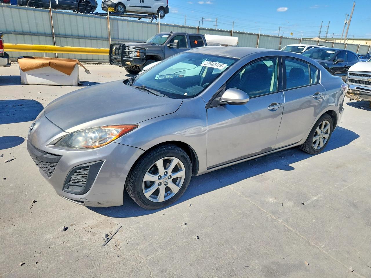 2011 Mazda 3 i Touring, VIN JM1BL1VF4B1427312 — Град