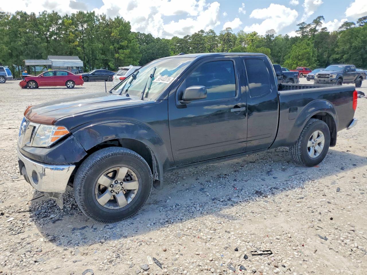 2011 Nissan Frontier SV, VIN 1N6AD0CUXBC406356 — Side
