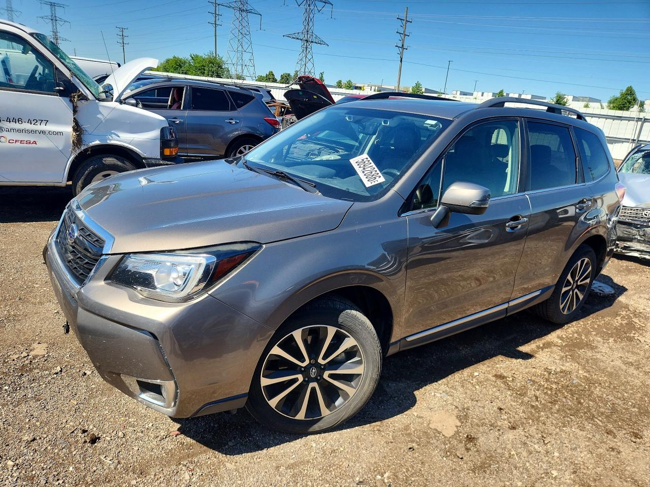 2017 Subaru Forester Touring, VIN JF2SJGWC1HH495596 — Rear end
